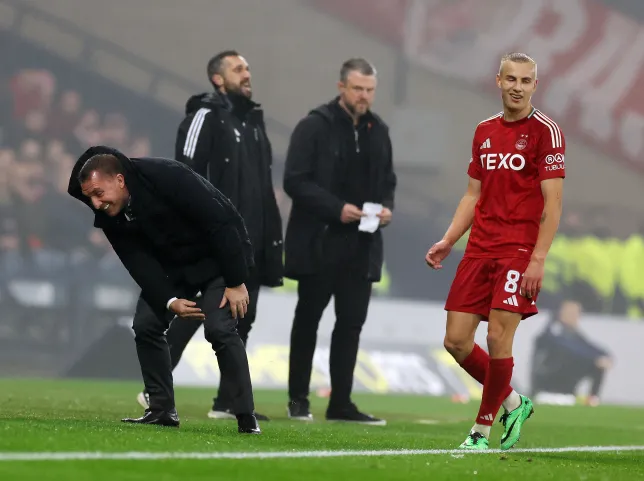 Brendan Rodgers takes a tumble while blasting ball in Celticâ€™s victory against Aberdeen